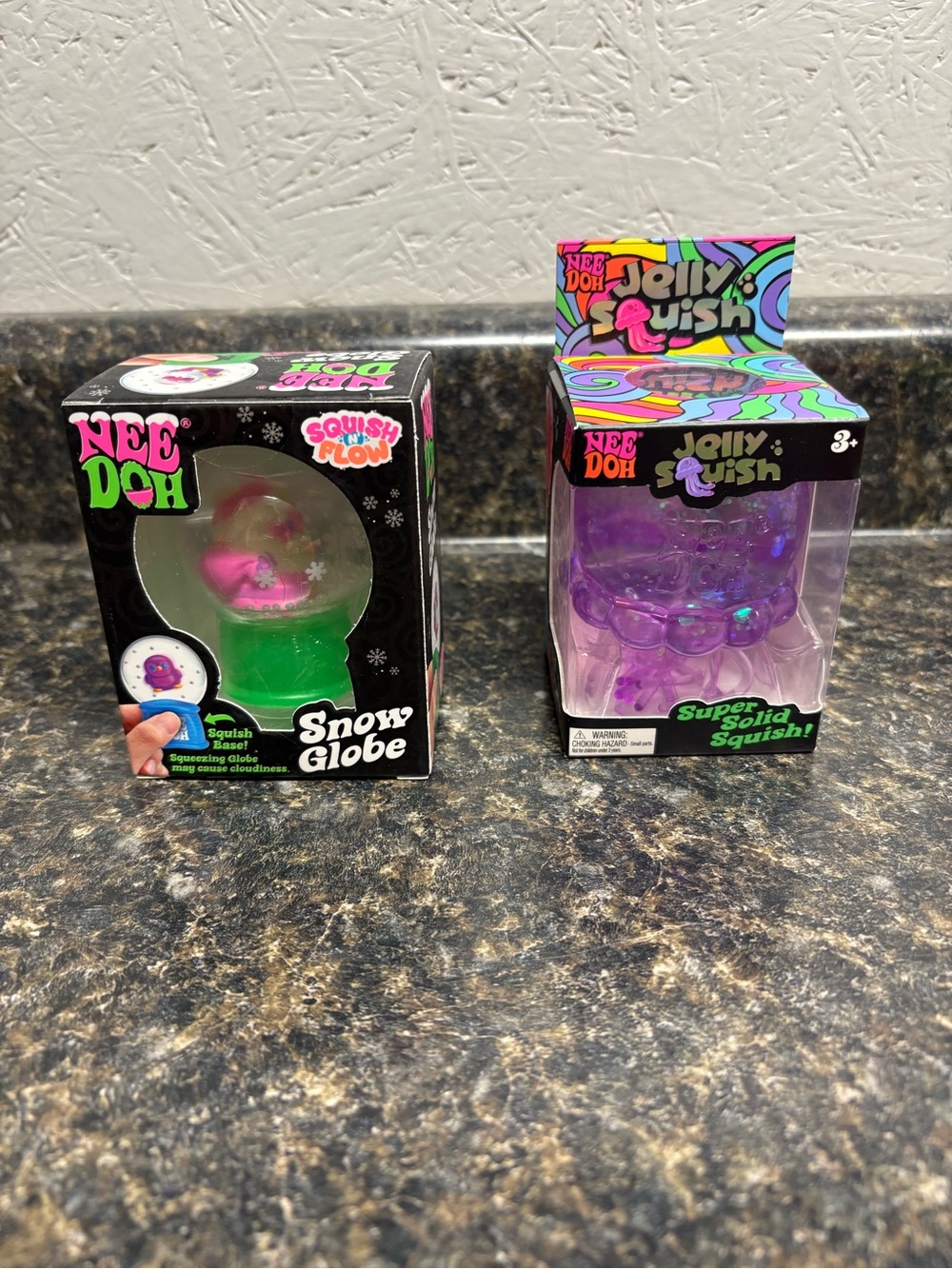 Needoh Lot. Santa Snow Globe and Purple Jellyfish.